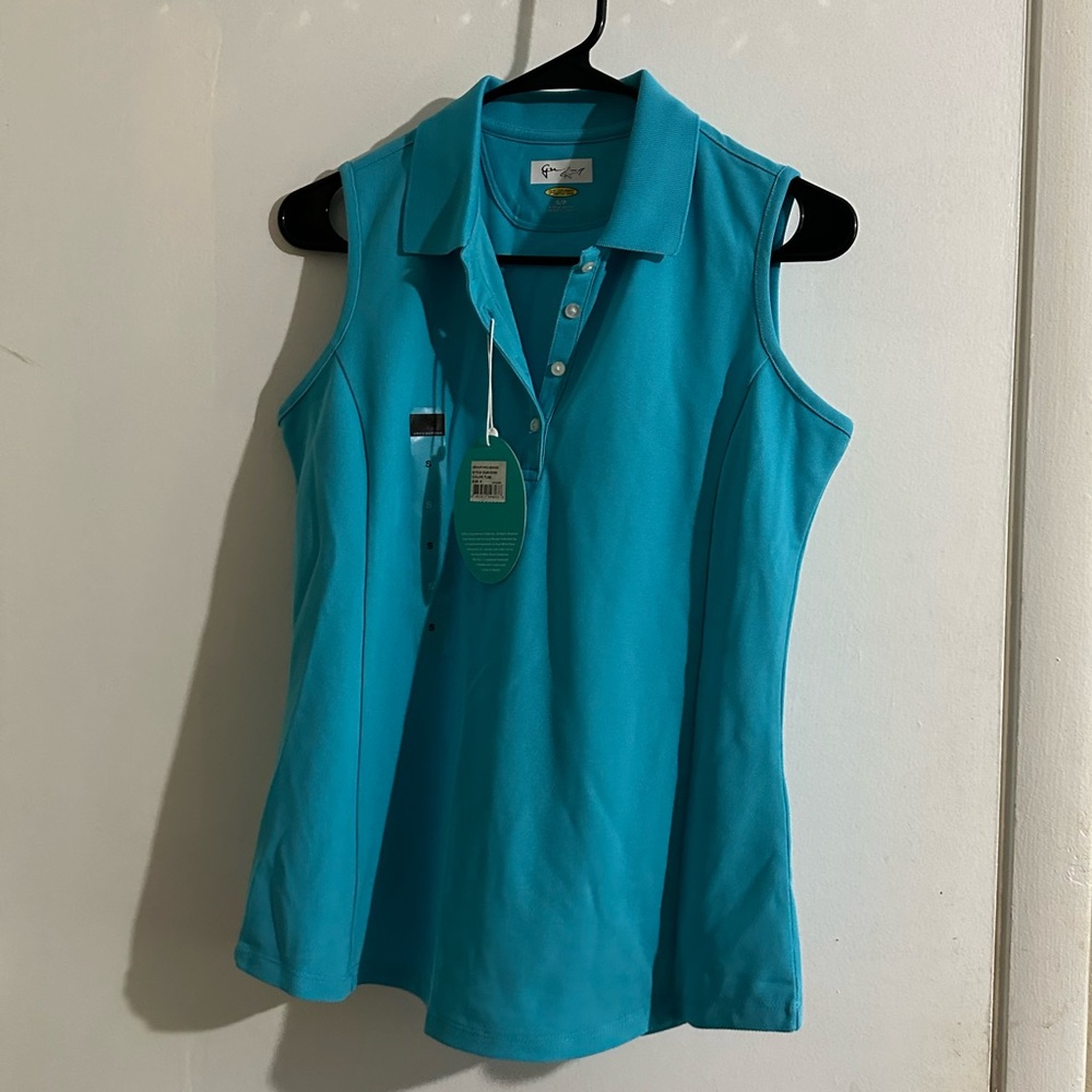 Greg Norman turquoise golf polo